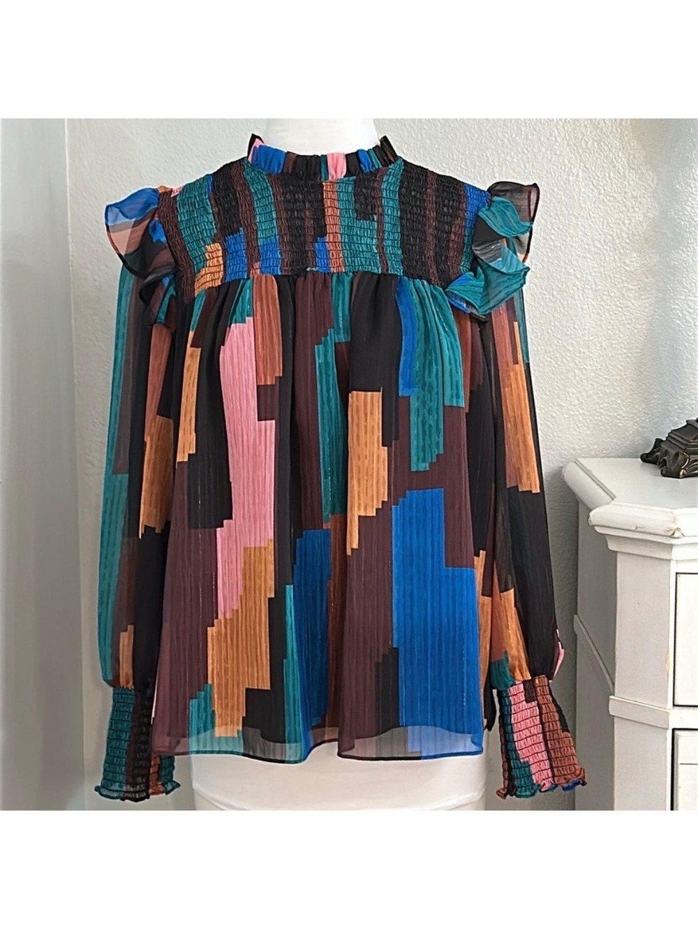 Willa Story Cates Colorful Geometric Patterned Sheer Blouse with Ruffle Details